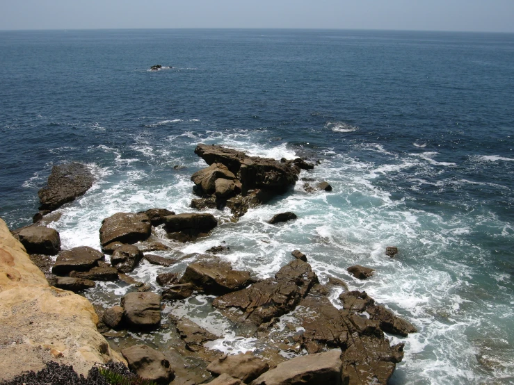 the rocks are covered in sea water