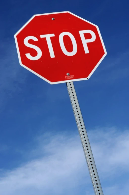 a stop sign sitting on top of a pole