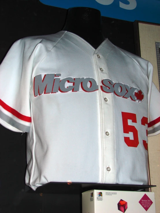 a baseball jersey is displayed in a store display