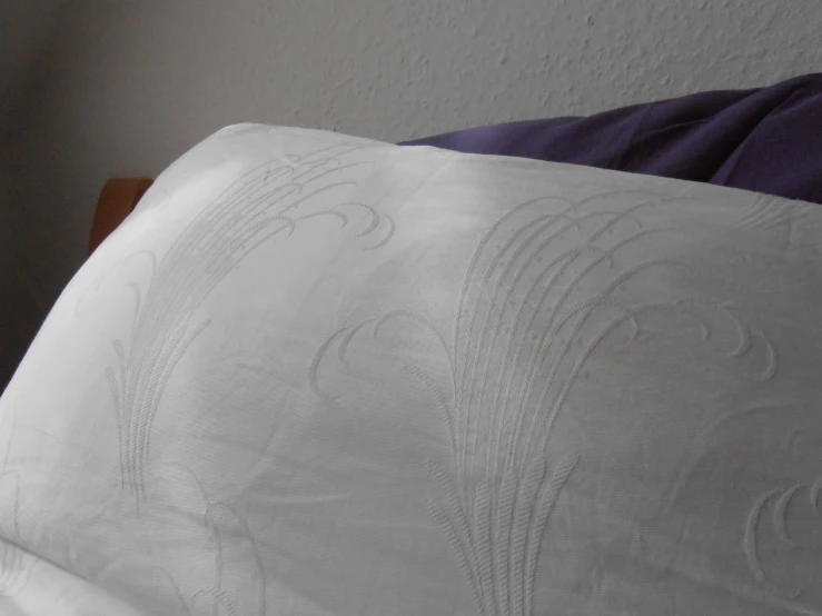 the comforter has a wavy design on it