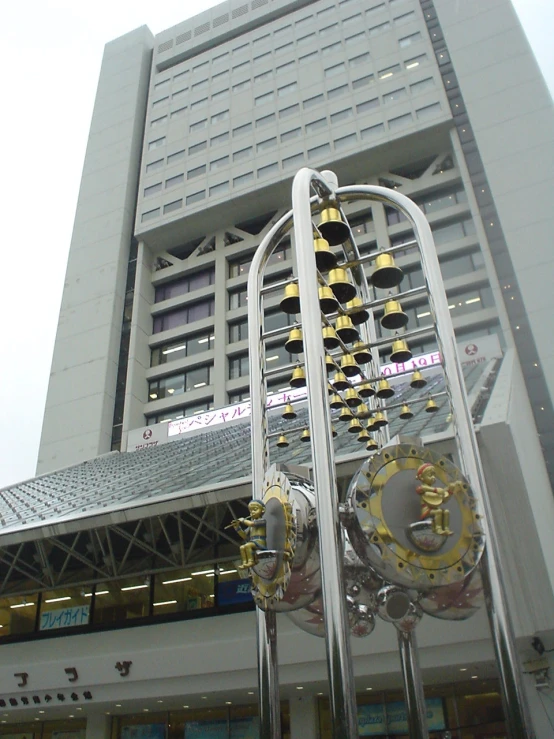 a tall building with lots of windows and clocks