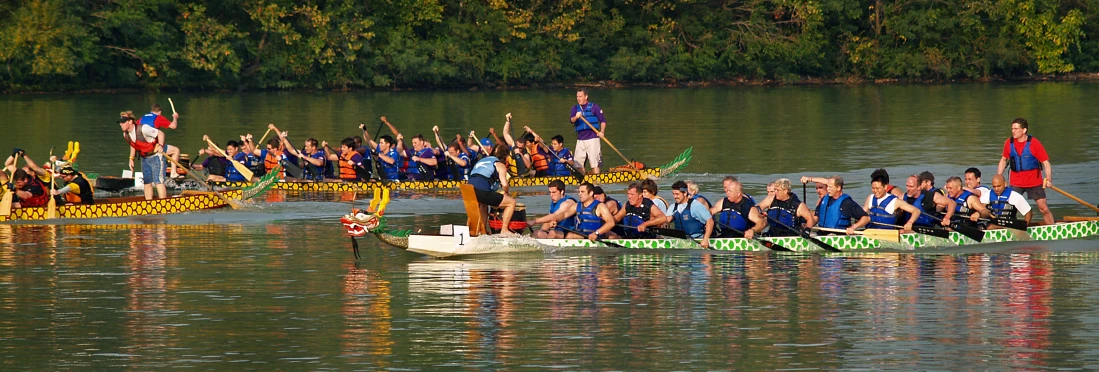 a long boat that has many people on it