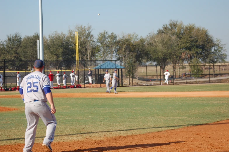 the baseball players are getting ready to play