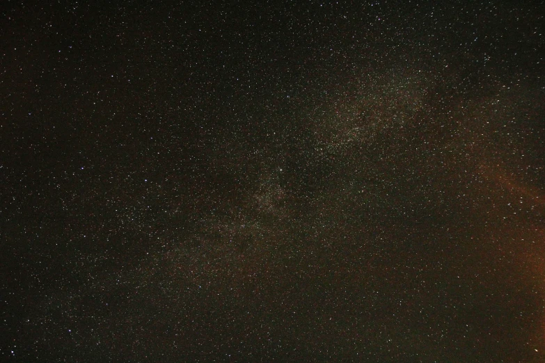 a field filled with lots of stars covered in sky