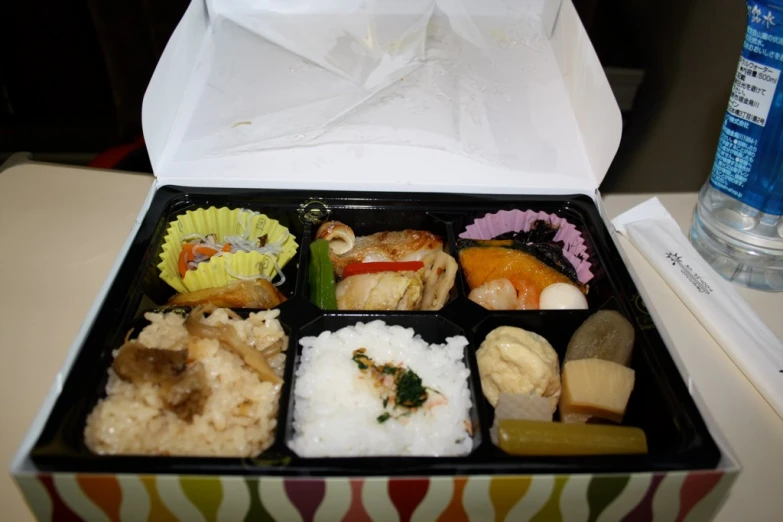 a bento box filled with various types of food