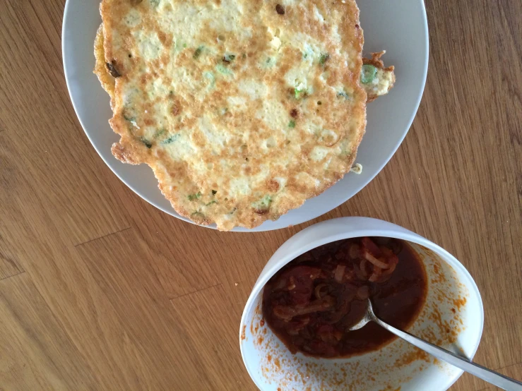 two tasty looking food items on white plates