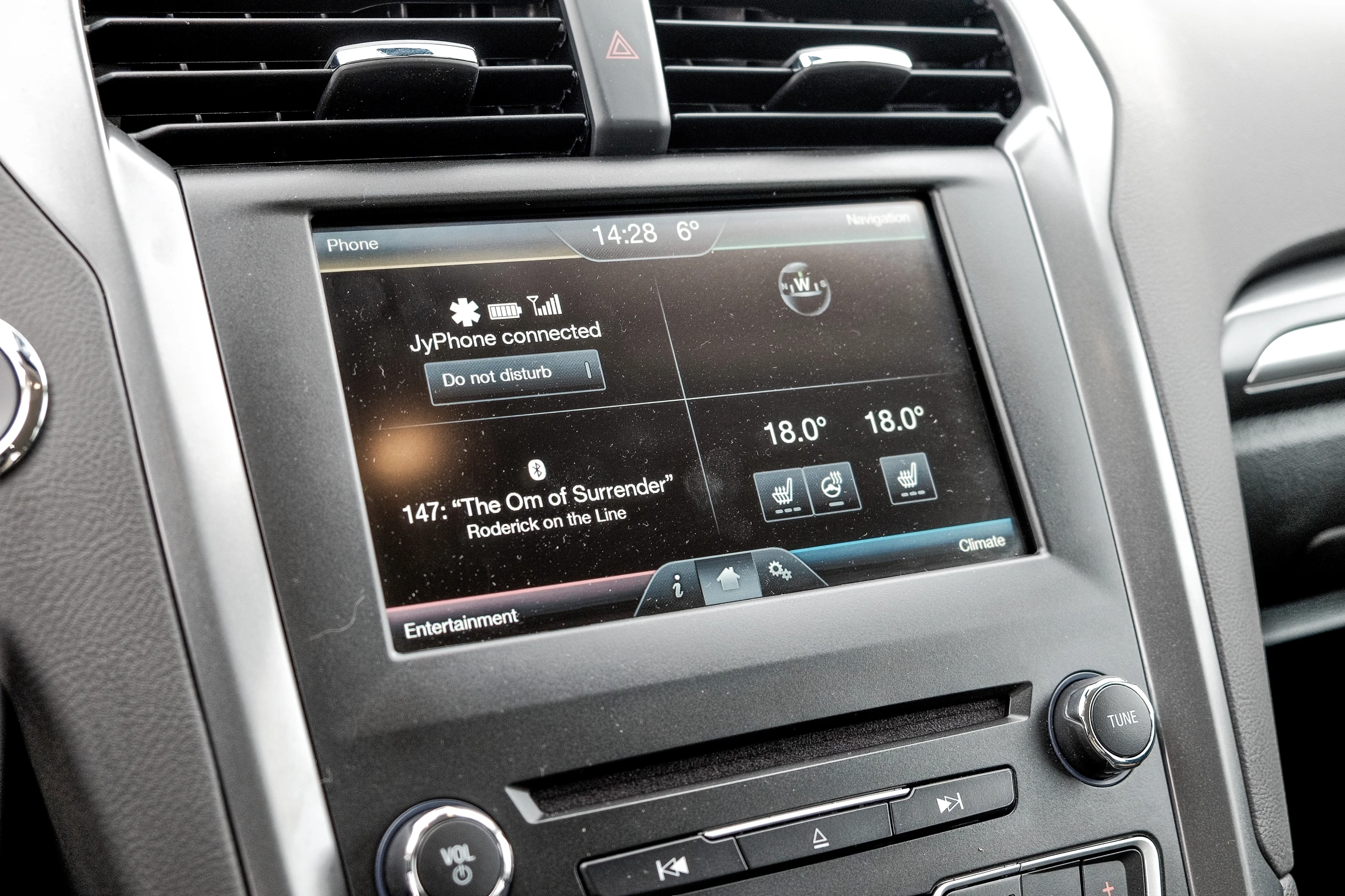 the dashboard in a vehicle with radio and other information