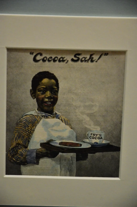 the portrait is of an african american guy holding a plate and smiling
