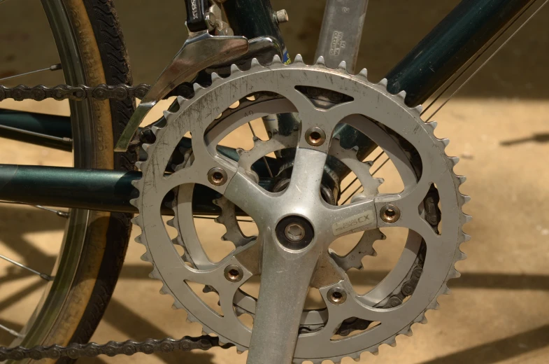 an image of a bike wheel that has gear attached to it