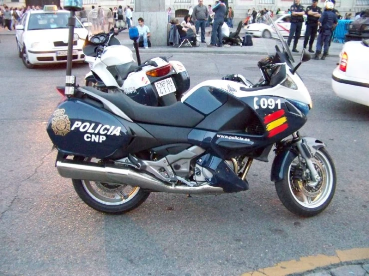 a police motorcycle sitting in the middle of the street