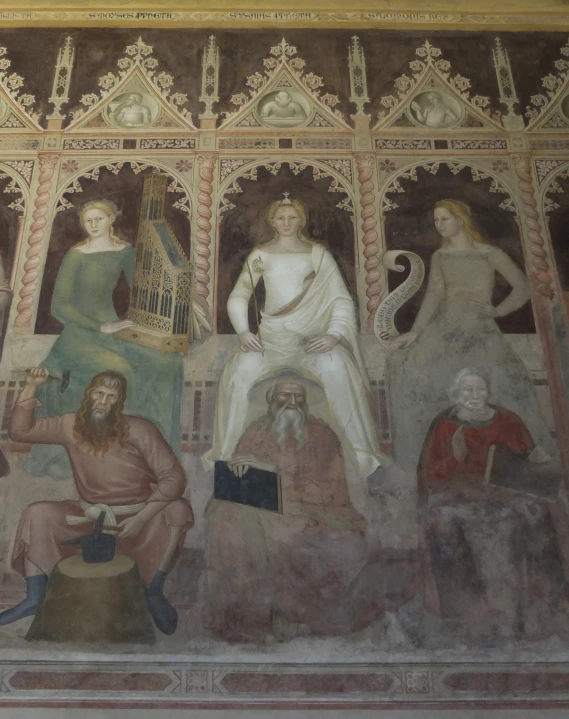 the painting on the wall depicts a number of figures