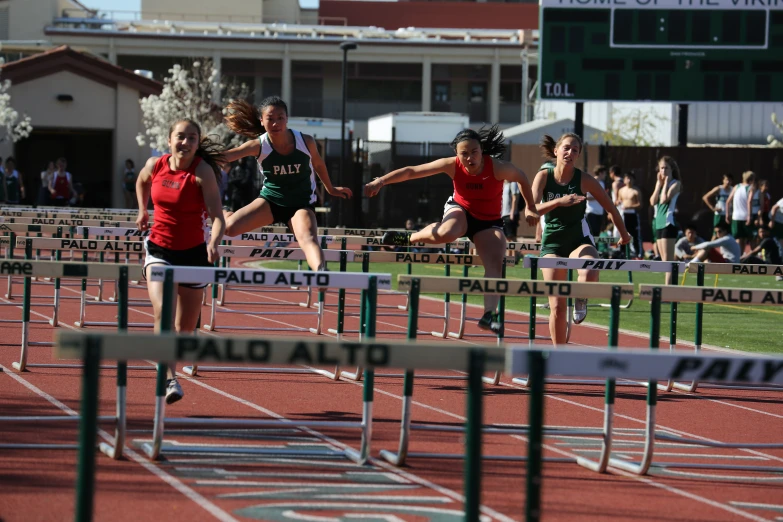 a group of female runners competing in the race