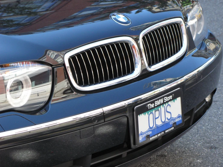 a black car is shown with the license plate on it