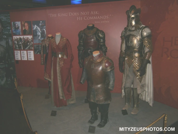 a room full of costumes that are on display