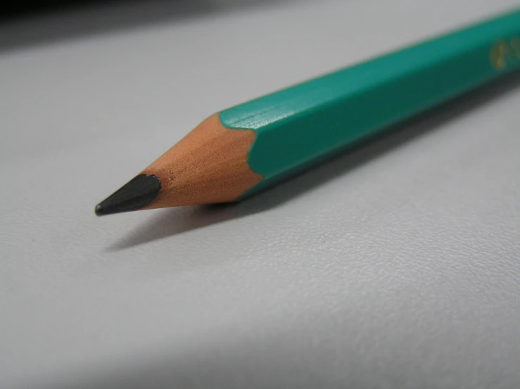 a pencil with the tip of it's green end