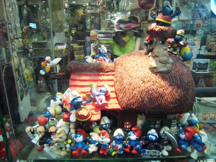 an arrangement of doll and stuffed animal toys