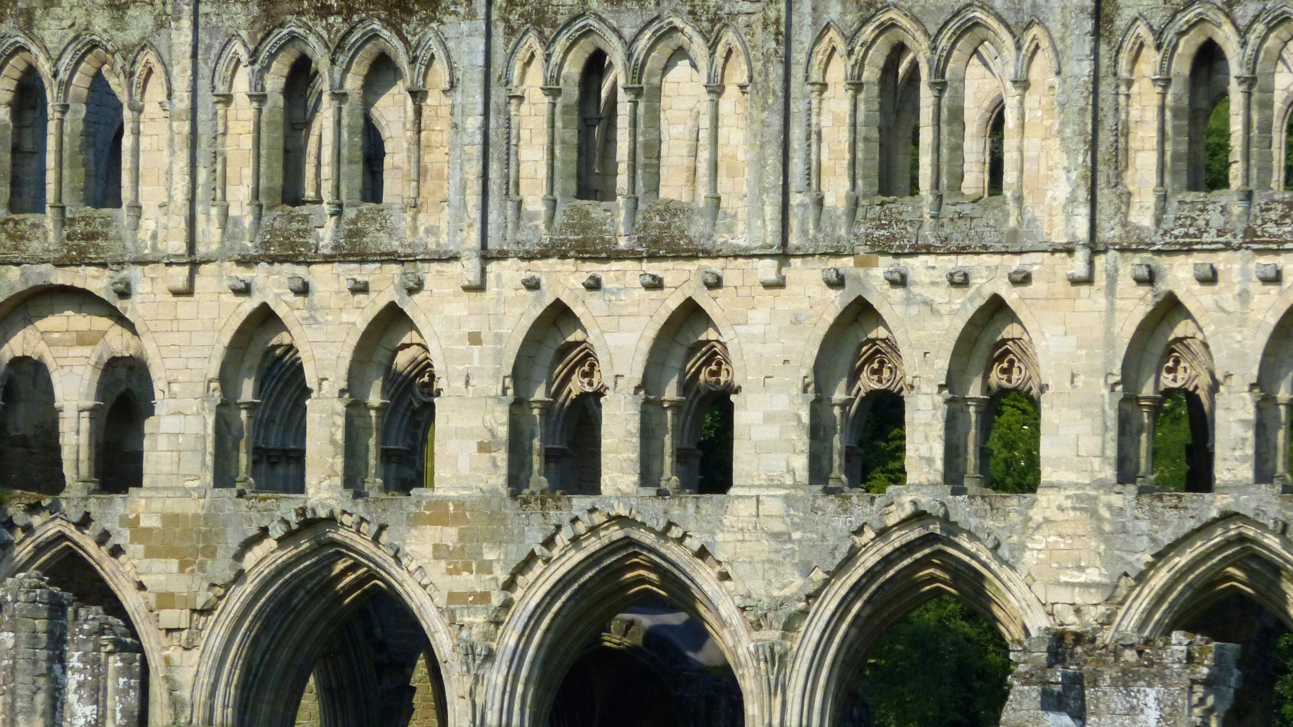 the interior and arch of an ancient cathedral