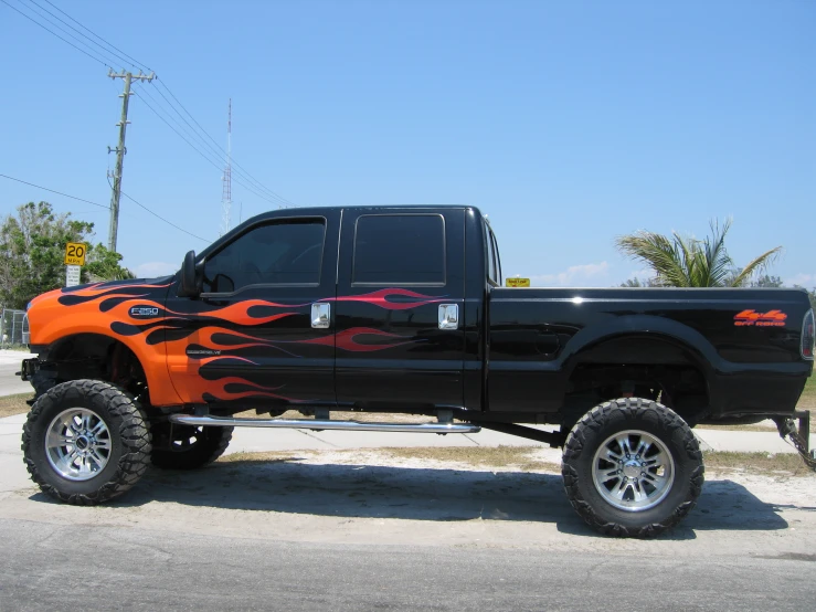 this is a truck that looks to be painted orange and red