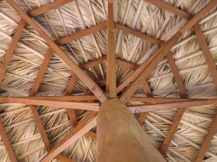 a close up of the wooden structure of a wooden roof