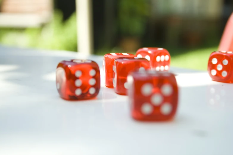 a close up of six dice on a table