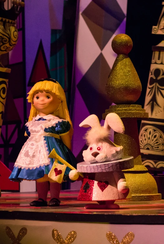 an image of a doll with bunny in a fairy tale setting