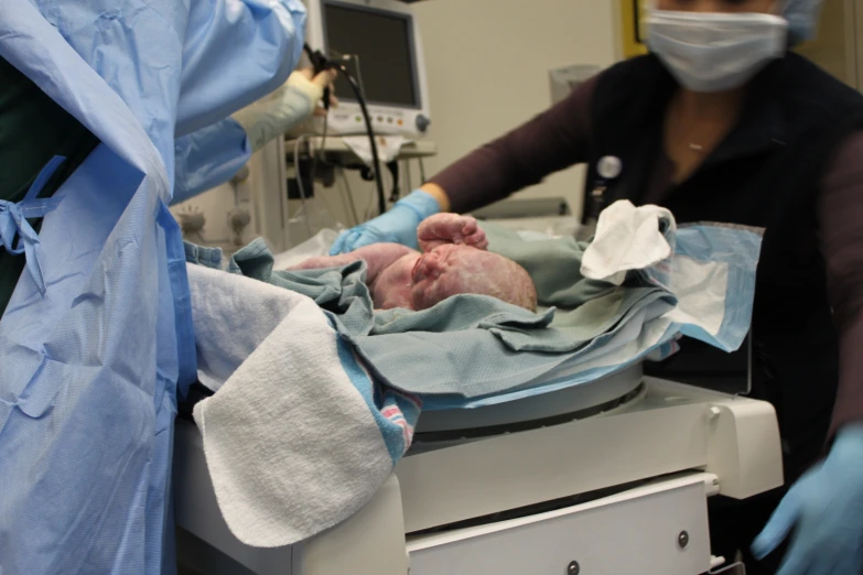 a baby is hooked up to a hospital machine