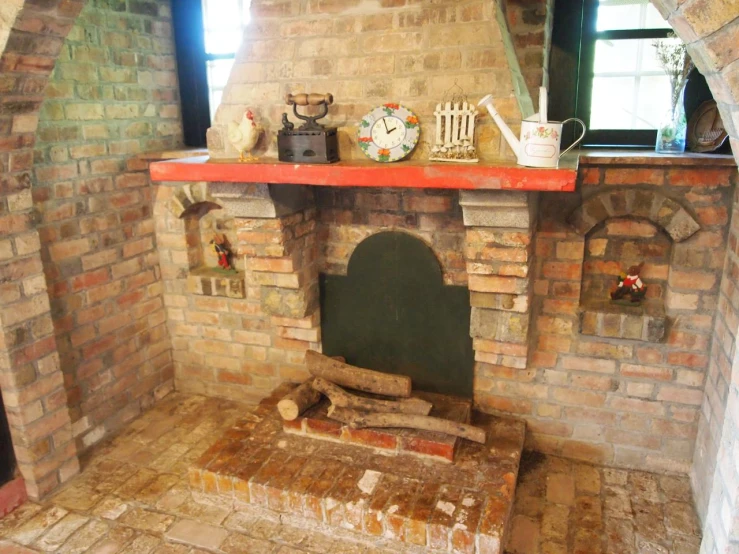 a fireplace with a green mantle on top