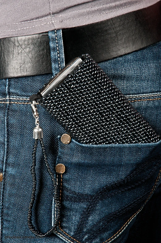 a pocket with a tie clip sticking out of it