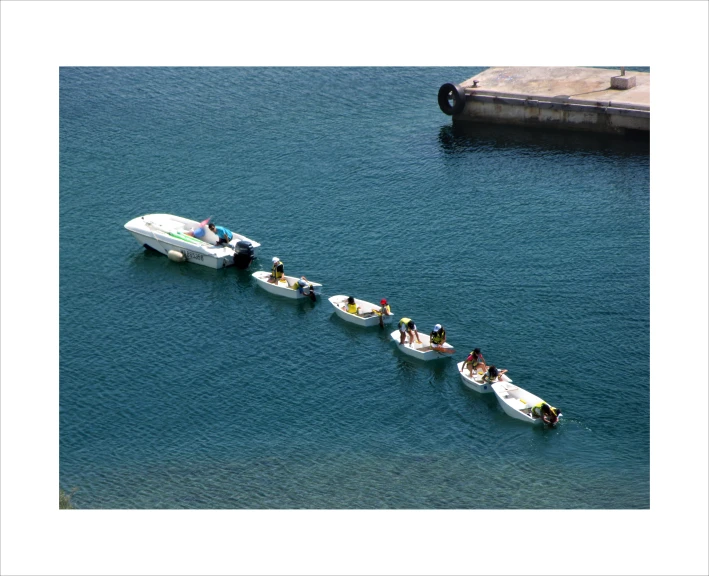 the people are in their boat and ready to go on a tour