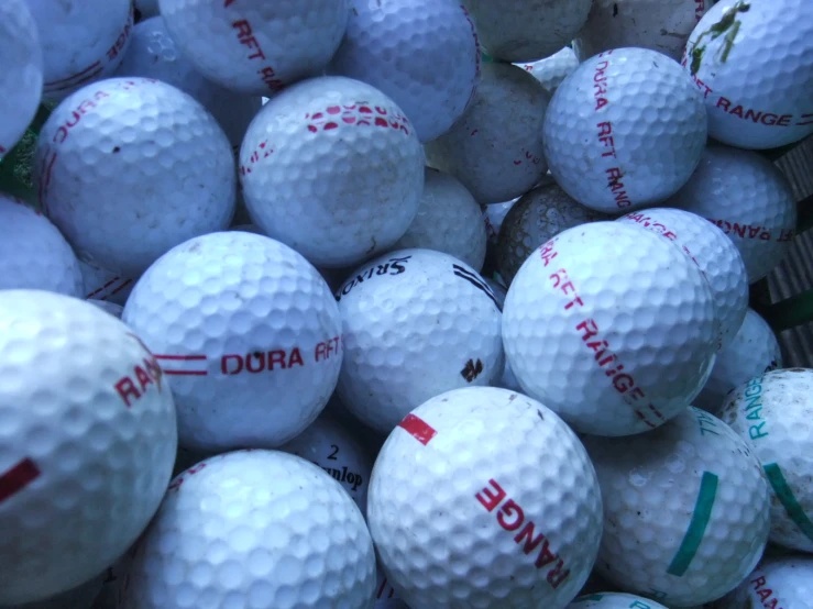 a pile of many balls of different sizes and names