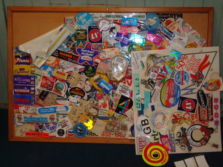 an arrangement of various stickers and pins are displayed