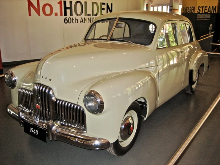 a classic car on display at a museum