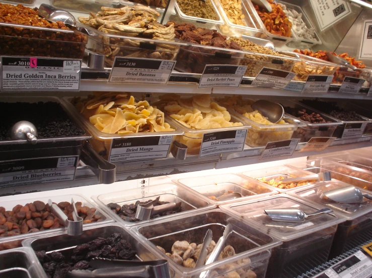 a deli filled with lots of different kinds of foods