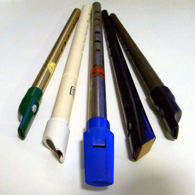 several pens are shown in four different styles