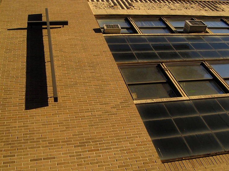 a view of a cross outside of a building