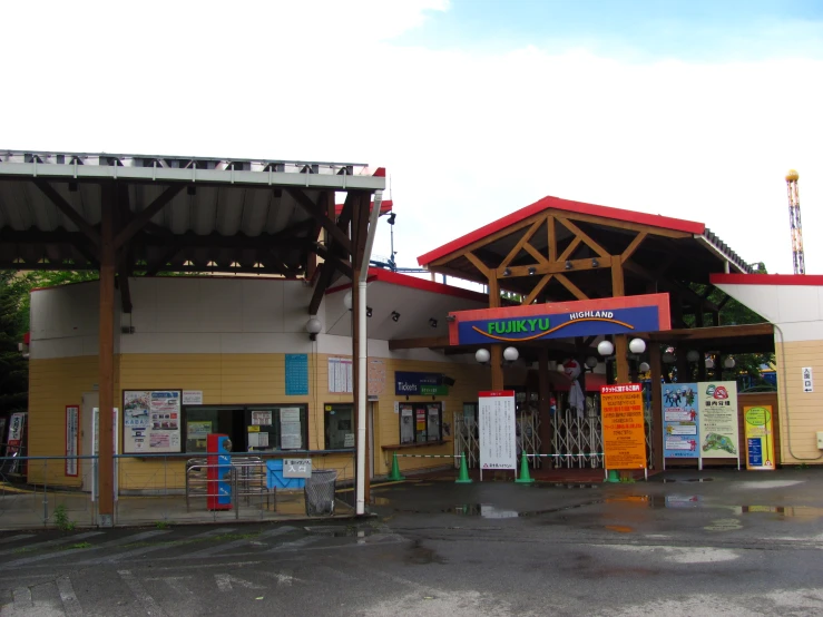 the outside of a building with many signs