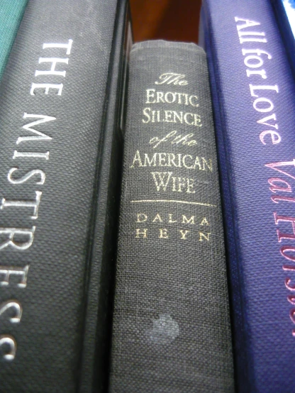 an american wire books are stacked together