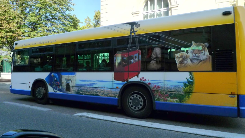 a bus with a colorful artwork painted on it
