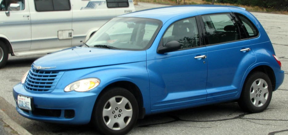 a blue and white car is in parking lot