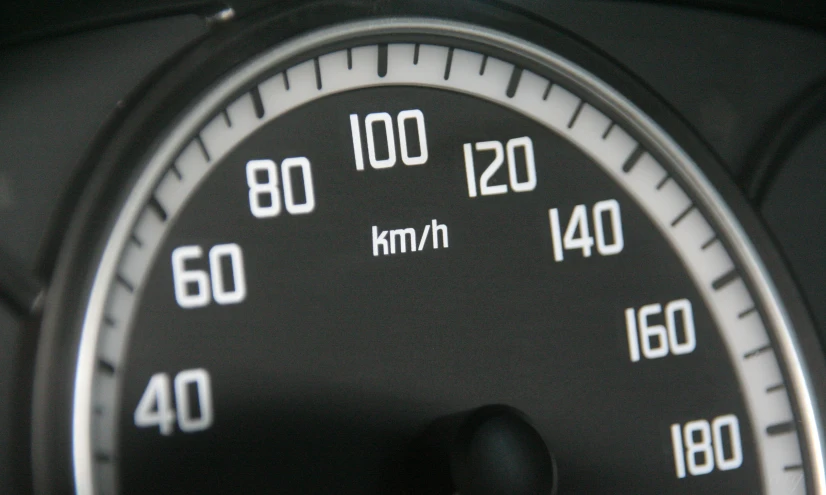 the dash board of a car showing speed