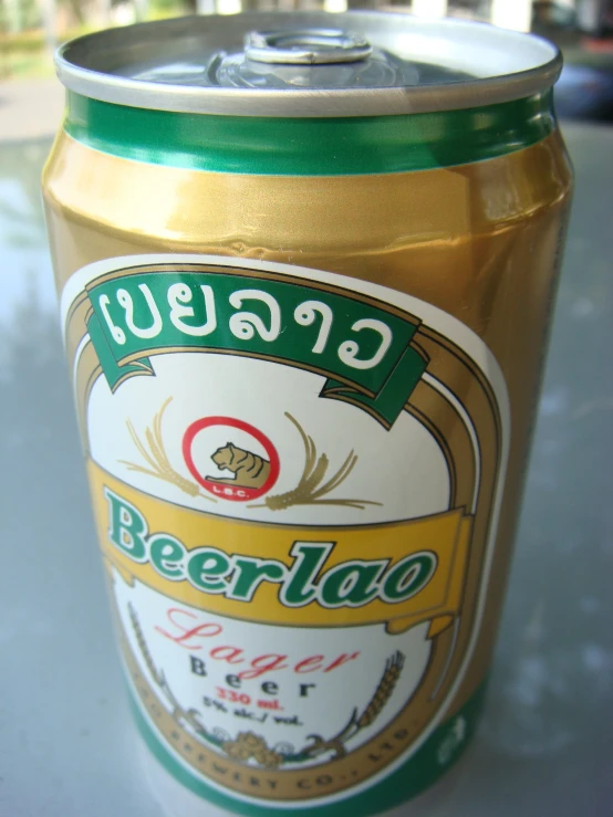 a canned beer sitting on a table