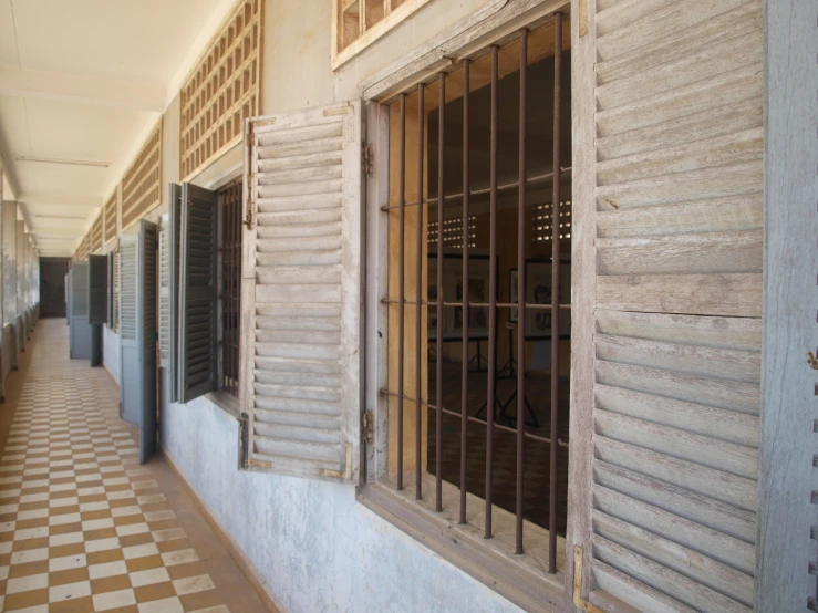 the view out the windows of an old prison cell