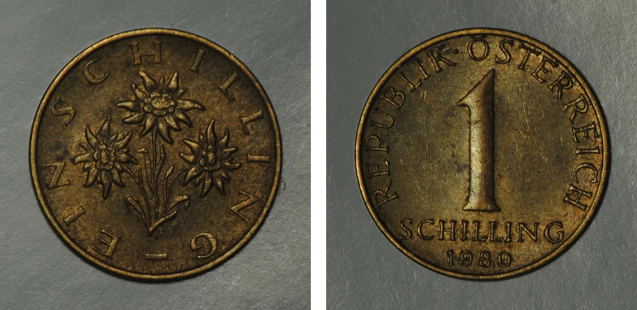 two gold tokens that show an american one penny