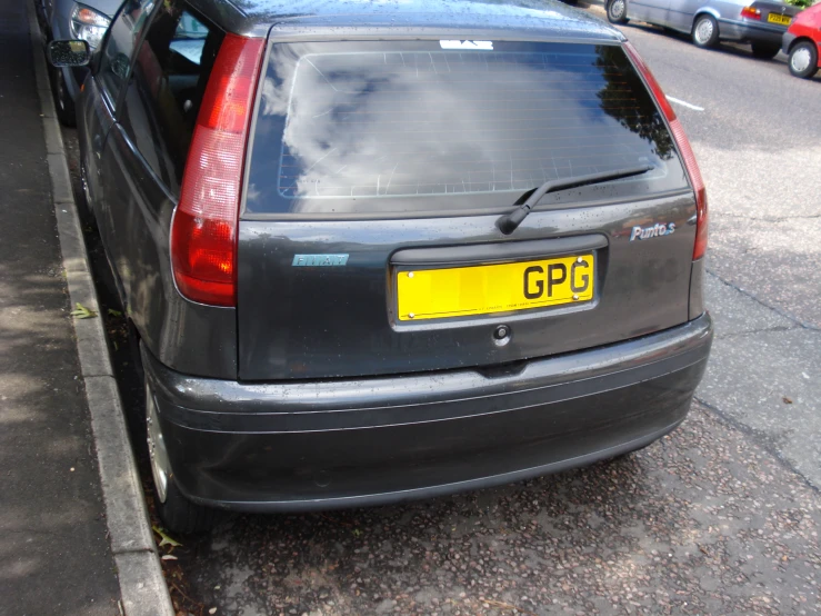 a back view of a car on the street