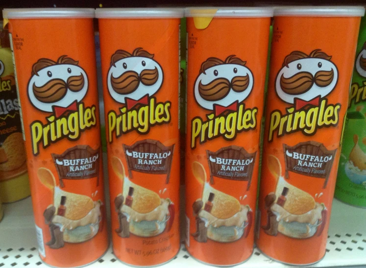 three pringles are on display in the store