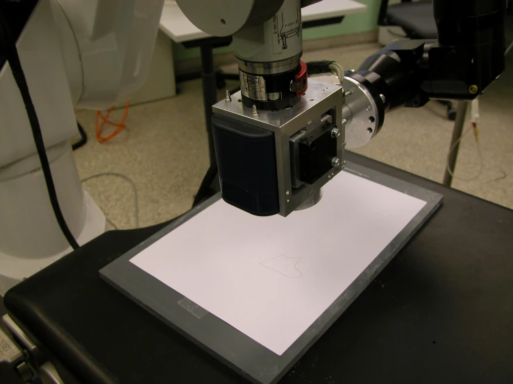 a machine in use to print an electronic device