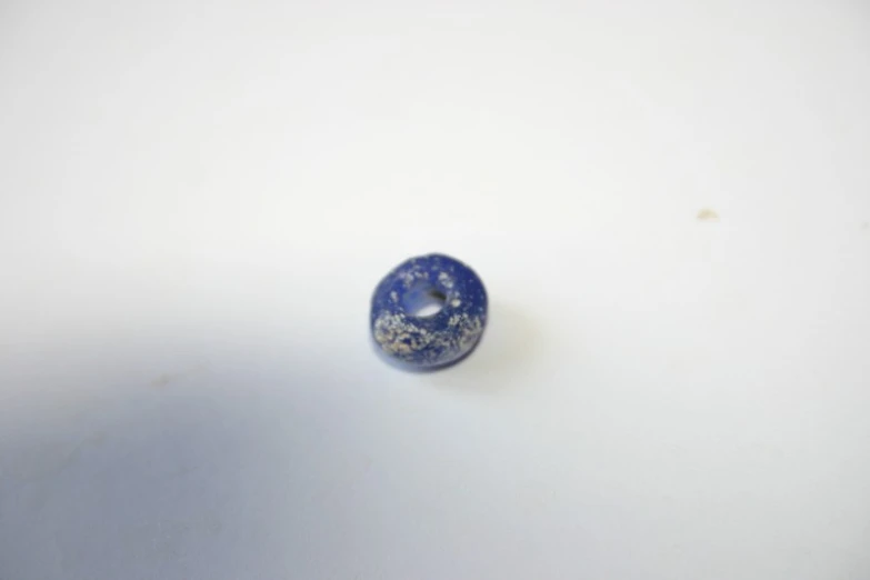 an image of a blue ball that is on the table