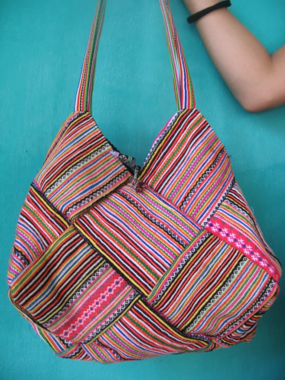 the striped purse is made from various materials