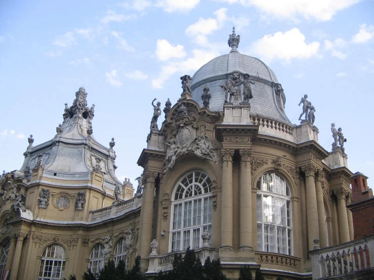 the top part of a large building with ornate architecture