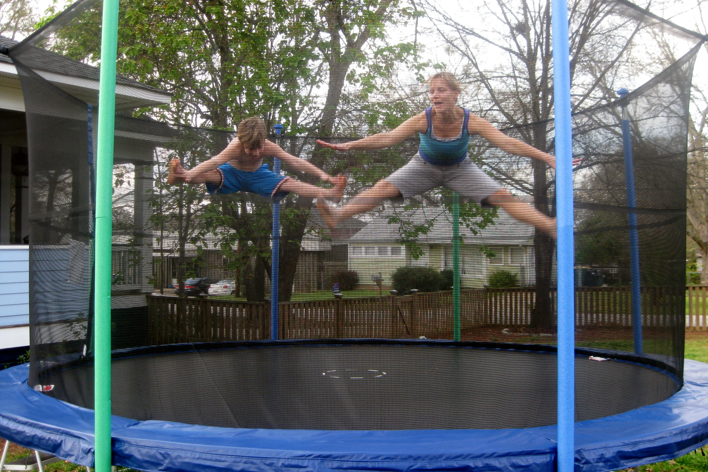 two s are in a large trampoline